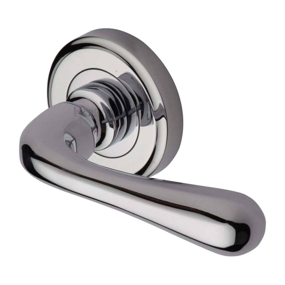 This is an image of a Heritage Brass - Door Handle Lever Latch on Round Rose Charlbury Design Polished Chr, v3020-pc that is available to order from Trade Door Handles in Kendal.