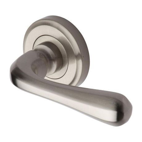 This is an image of a Heritage Brass - Door Handle Lever Latch on Round Rose Charlbury Design Satin Nic, v3020-sn that is available to order from Trade Door Handles in Kendal.