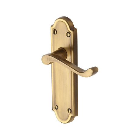 This is an image of a Heritage Brass - Door Handle Lever Latch Meridian Design Antique Brass Finish, v313-at that is available to order from Trade Door Handles in Kendal.