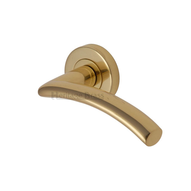 This is an image of a Heritage Brass - Door Handle Lever Latch on Round Rose Centaur Design Polished Brass, v3490-pb that is available to order from Trade Door Handles in Kendal.