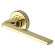 This is an image of a Heritage Brass - Door Handle Lever Latch on Round Rose Metro Angled Design Polished, v3790-pb that is available to order from Trade Door Handles in Kendal.