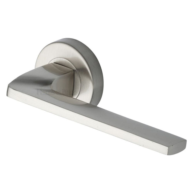 This is an image of a Heritage Brass - Door Handle Lever Latch on Round Rose Metro Angled Design Satin, v3790-sn that is available to order from Trade Door Handles in Kendal.