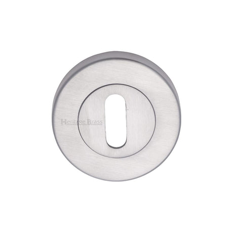 This is an image of a Heritage Brass - Key Escutcheon Satin Chrome Finish, v4000-sc that is available to order from Trade Door Handles in Kendal.