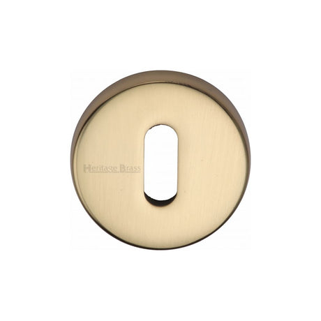 This is an image of a Heritage Brass - Key Escutcheon Polished Brass Finish, v4007-pb that is available to order from Trade Door Handles in Kendal.