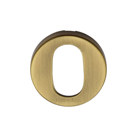 This is an image of a Heritage Brass - Oval Profile Cylinder Escutcheon Antique Brass Finish, v4009-at that is available to order from Trade Door Handles in Kendal.