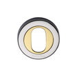 This is an image of a Heritage Brass - Oval Profile Cylinder Escutcheon Chrome & Brass Finish, v4010-cb that is available to order from Trade Door Handles in Kendal.