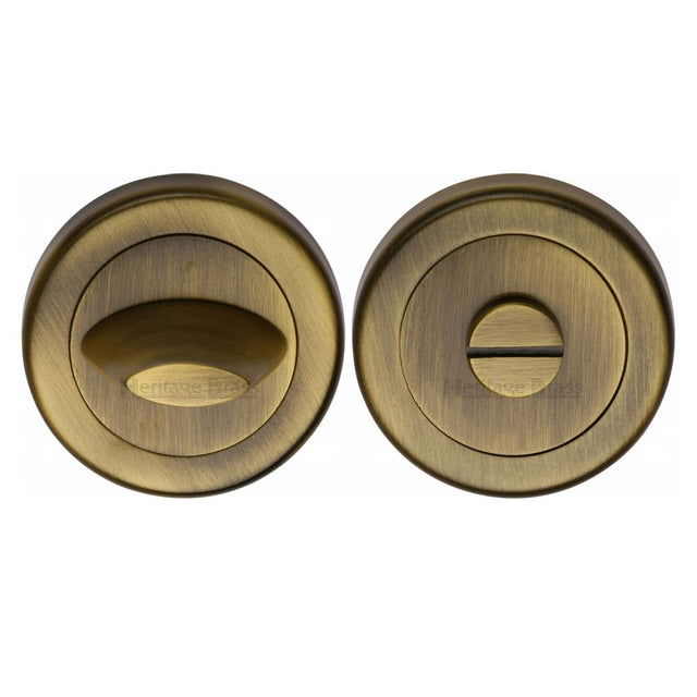 This is an image of a Heritage Brass - Thumbturn & Emergency Release for Bathroom & Bedroom Doors Antique, v4043-at that is available to order from Trade Door Handles in Kendal.