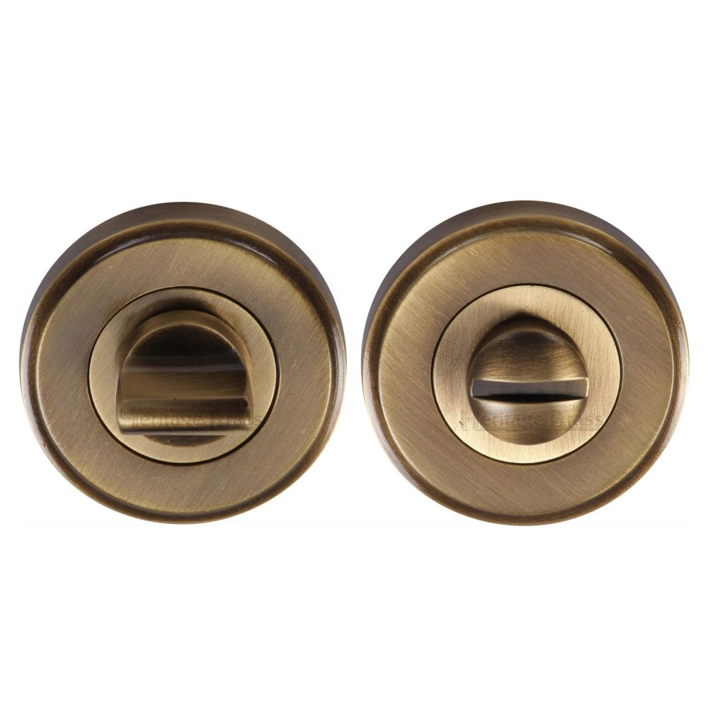 This is an image of a Heritage Brass - Thumbturn & Emergency Release Antique Brass Finish, v4045-at that is available to order from Trade Door Handles in Kendal.