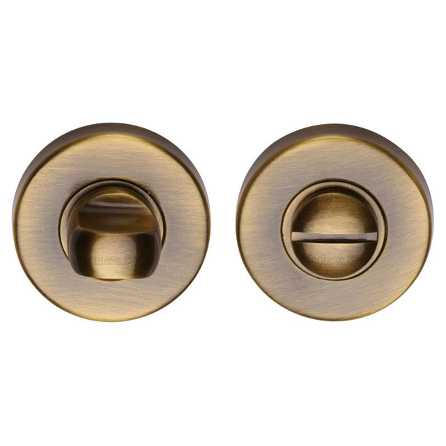 This is an image of a Heritage Brass - Thumbturn & Emergency Release Antique Brass Finish, v4049-at that is available to order from Trade Door Handles in Kendal.