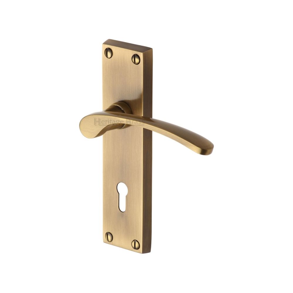 This is an image of a Heritage Brass - Door Handle Lever Lock Sophia Design Antique Brass Finish, v4130-at that is available to order from Trade Door Handles in Kendal.