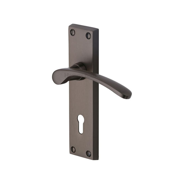 This is an image of a Heritage Brass - Door Handle Lever Lock Sophia Design Matt Bronze Finish, v4130-mb that is available to order from Trade Door Handles in Kendal.