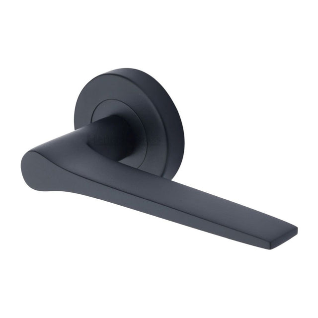 This is an image of a Heritage Brass - Door Handle Lever on Rose Gio Design Matt Black Finish, v4189-bkmt that is available to order from Trade Door Handles in Kendal.