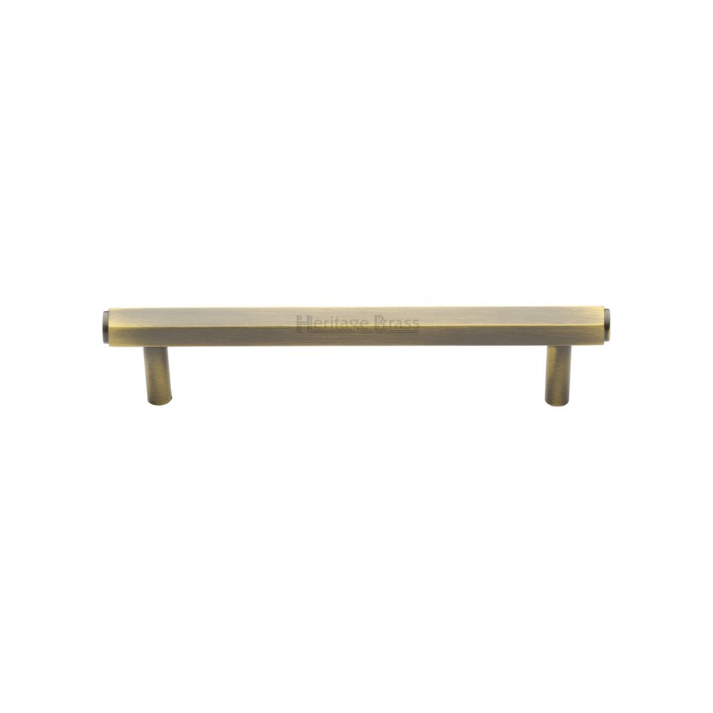 This is an image of a Heritage Brass - Cabinet Pull Hexagon Design 128mm CTC Antique Brass Finish, v4422-128-at that is available to order from Trade Door Handles in Kendal.