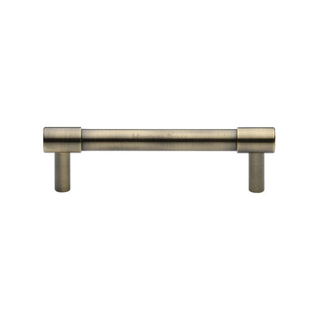 This is an image of a Heritage Brass - Cabinet Pull Phoenix Design 96mm CTC Antique Brass Finish, v4434-96-at that is available to order from Trade Door Handles in Kendal.