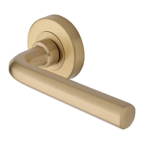 This is an image of a Heritage Brass - Door Handle Lever Latch on Round Rose Octave Design Satin Brass, v4545-sb that is available to order from Trade Door Handles in Kendal.