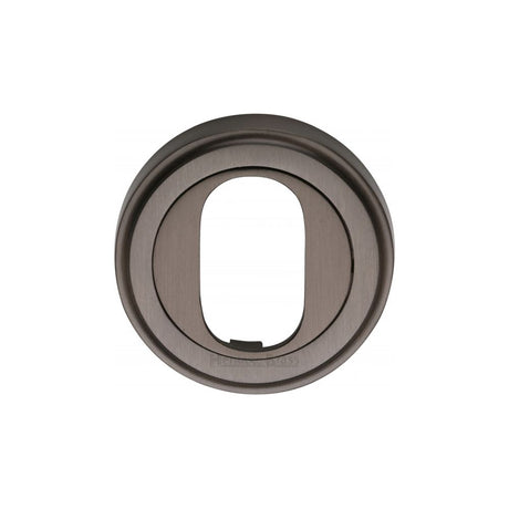 This is an image of a Heritage Brass - Oval Profile Cylinder Escutcheon Matt Bronze Finish, v5010-mb that is available to order from Trade Door Handles in Kendal.