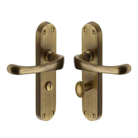 This is an image of a Heritage Brass - Door Handle for Bathroom Gloucester Design Antique Brass Finish, v6070-at that is available to order from Trade Door Handles in Kendal.