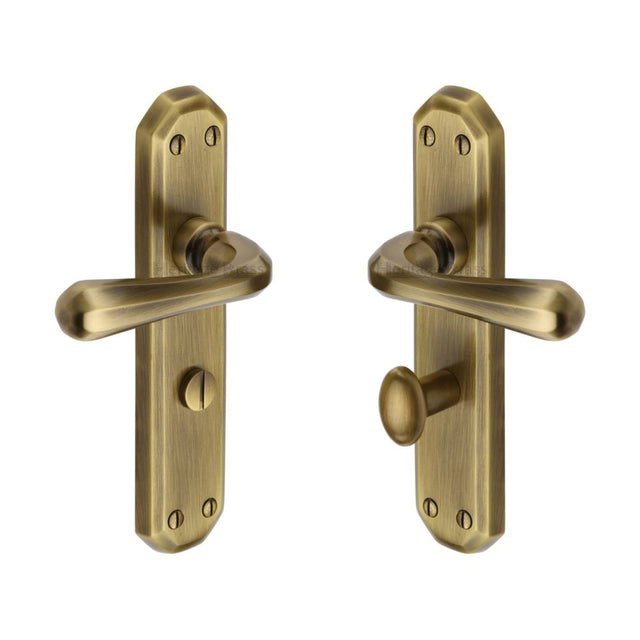 This is an image of a Heritage Brass - Door Handle for Bathroom Charlbury Design Antique Brass Finish, v7070-at that is available to order from Trade Door Handles in Kendal.