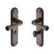 This is an image of a Heritage Brass - Door Handle Bathroom Set Charlbury Design Matt Bronze Finish, v7070-mb that is available to order from Trade Door Handles in Kendal.