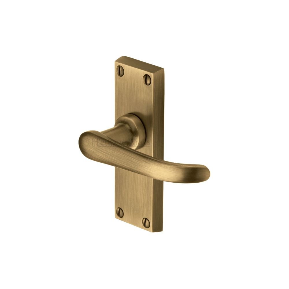 This is an image of a Heritage Brass - Door Handle Lever Latch Windsor Short Design Antique Brass Finish, v710-at that is available to order from Trade Door Handles in Kendal.