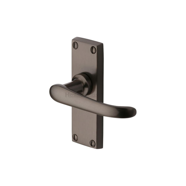 This is an image of a Heritage Brass - Door Handle Lever Latch Windsor Short Design Matt Bronze Finish, v710-mb that is available to order from Trade Door Handles in Kendal.