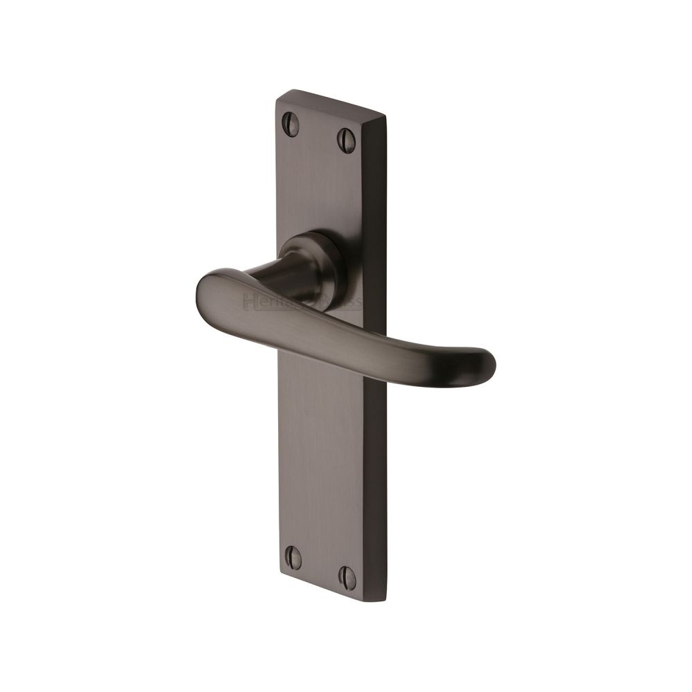 This is an image of a Heritage Brass - Door Handle Lever Latch Windsor Design Matt Bronze Finish, v713-mb that is available to order from Trade Door Handles in Kendal.