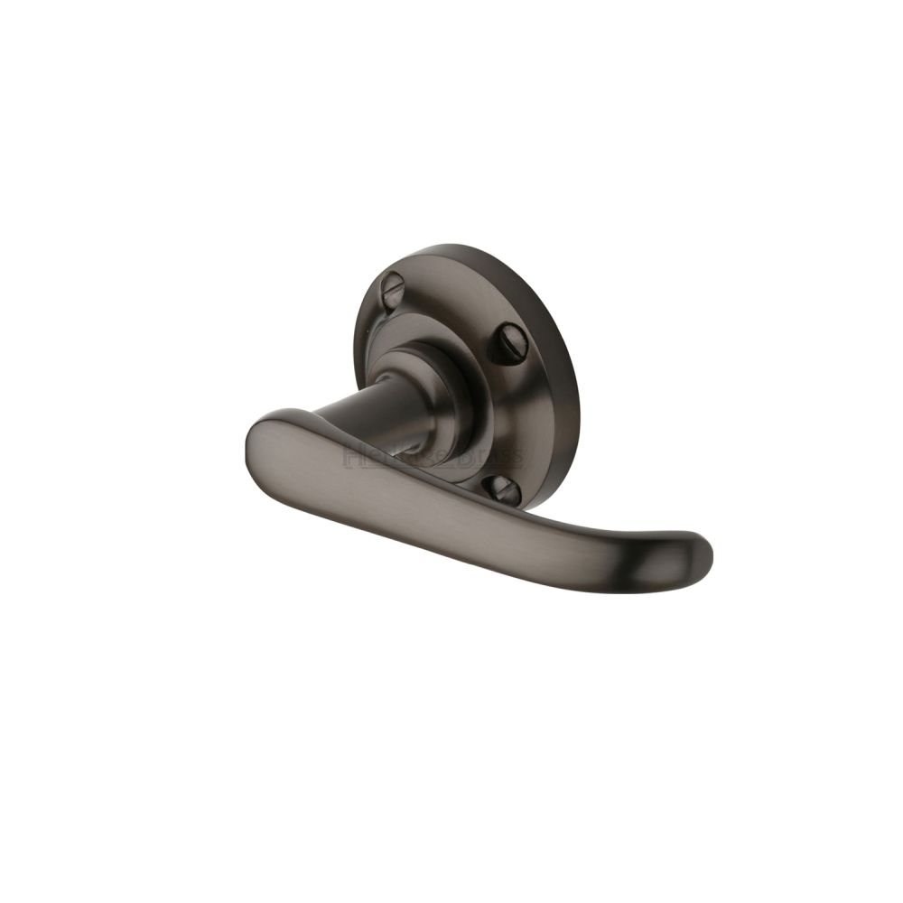 This is an image of a Heritage Brass - Door Handle Lever on Rose Windsor Design Matt Bronze Finish, v720-mb that is available to order from Trade Door Handles in Kendal.