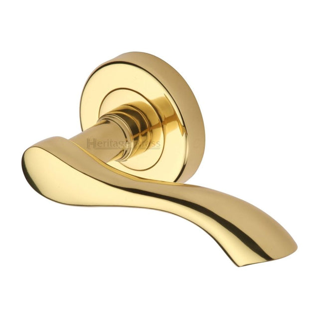 This is an image of a Heritage Brass - Door Handle Lever Latch on Round Rose Algarve Design Polished Brass, v7210-pb that is available to order from Trade Door Handles in Kendal.