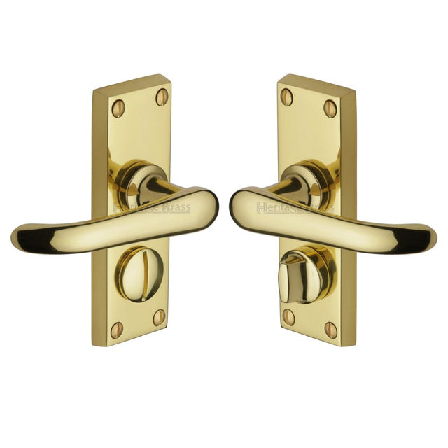 This is an image of a Heritage Brass - Door Handle for Privacy Set Windsor Short Design Polished Brass Fin, v735-pb that is available to order from Trade Door Handles in Kendal.