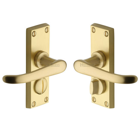 This is an image of a Heritage Brass - Door Handle for Privacy Set Windsor Short Design Satin Brass Fin, v735-sb that is available to order from Trade Door Handles in Kendal.