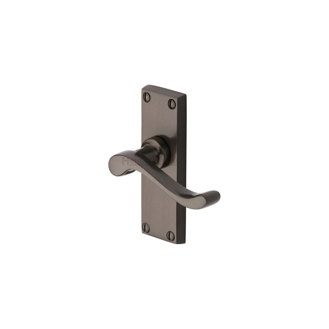 This is an image of a Heritage Brass - Door Handle Lever Latch Bedford Short Design Matt Bronze Finish, v800-mb that is available to order from Trade Door Handles in Kendal.