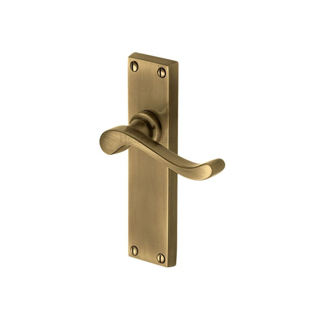 This is an image of a Heritage Brass - Door Handle Lever Latch Bedford Design Antique Brass Finish, v803-at that is available to order from Trade Door Handles in Kendal.