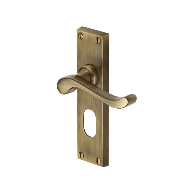 This is an image of a Heritage Brass - Door Handle for Oval Profile Plate Bedford Design Antique Brass Fi, v805-at that is available to order from Trade Door Handles in Kendal.