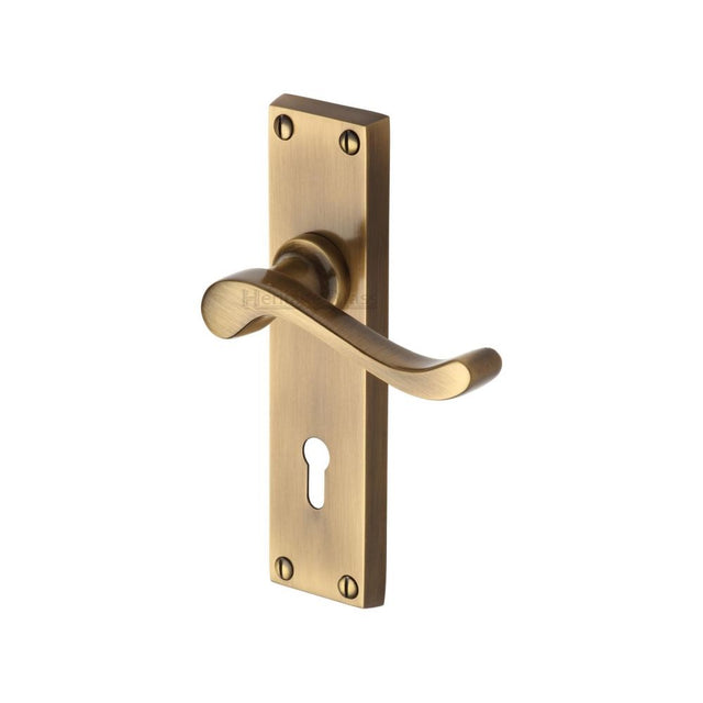 This is an image of a Heritage Brass - Door Handle Lever Lock Bedford Design Antique Brass Finish, v810-at that is available to order from Trade Door Handles in Kendal.