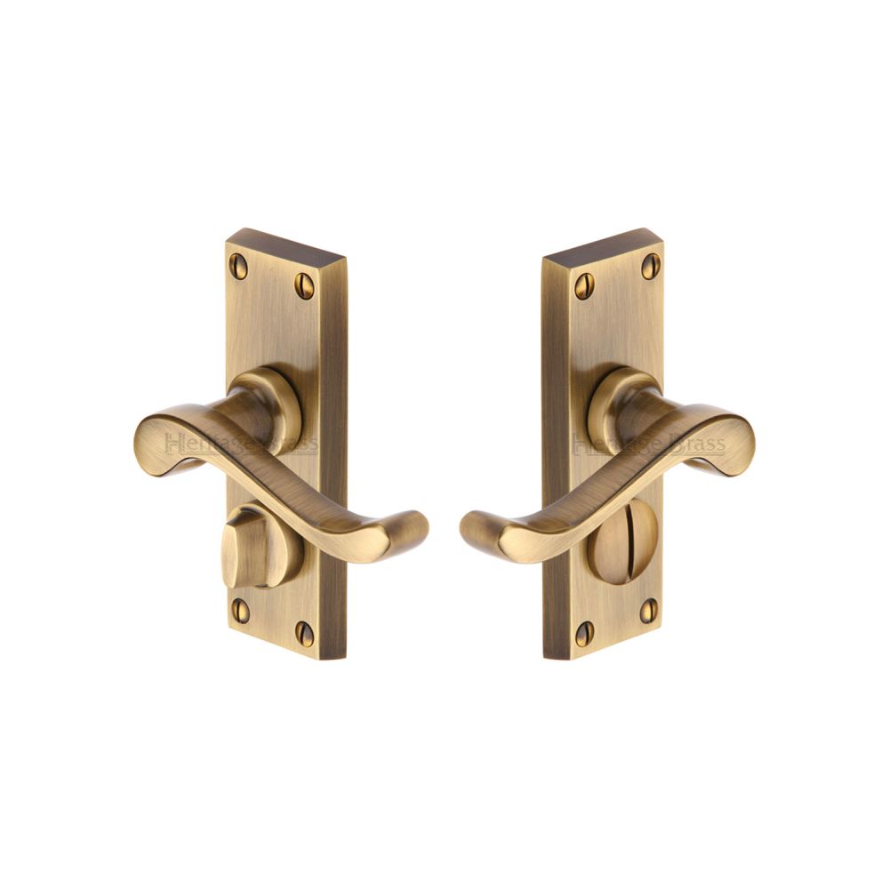 This is an image of a Heritage Brass - Door Handle for Privacy Set Bedford Short Design Antique Brass Fin, v825-at that is available to order from Trade Door Handles in Kendal.