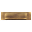 This is an image of a Heritage Brass - Gravity Letterplate 280 x 80mm - Antique Brass Finish, v842-at that is available to order from Trade Door Handles in Kendal.