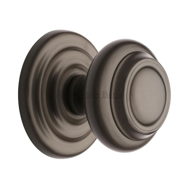 This is an image of a Heritage Brass - Centre Door Knob Round Design 3 1/2" Matt Bronze Finish, v905-mb that is available to order from Trade Door Handles in Kendal.