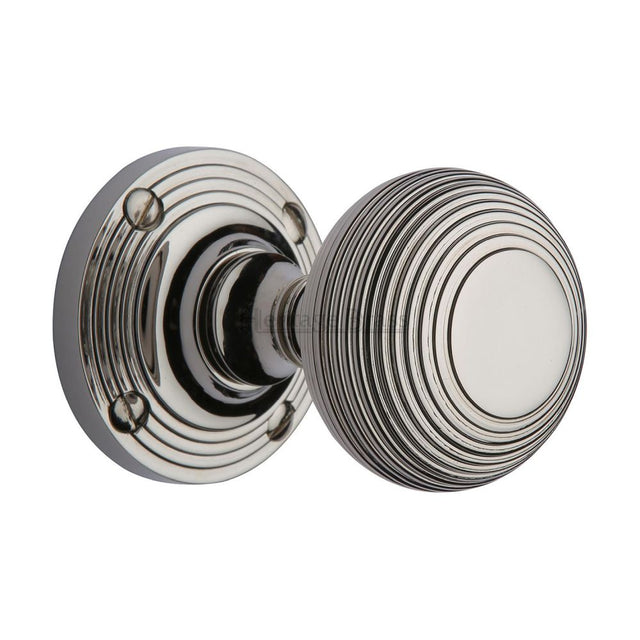 This is an image of a Heritage Brass - Mortice Knob on Rose Reeded Design Polished Nickel Finish, v971-pnf that is available to order from Trade Door Handles in Kendal.