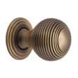 This is an image of a Heritage Brass - Cabinet Knob Reeded Design 32mm Antique Brass Finish, v973-32-at that is available to order from Trade Door Handles in Kendal.