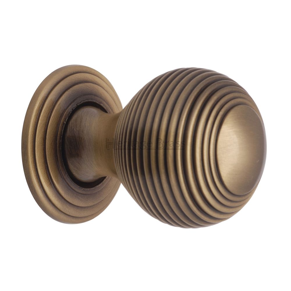 This is an image of a Heritage Brass - Cabinet Knob Reeded Design 32mm Antique Brass Finish, v973-32-at that is available to order from Trade Door Handles in Kendal.