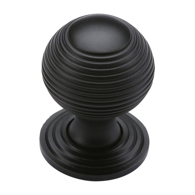 This is a image of a Heritage Brass - Cabinet Knob Reeded Design 32mm Matt Black Finish that is available to order from Trade Door Handles in Kendal