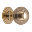 This is a image of a Heritage Brass - Cabinet Knob Reeded Design 32mm Pol. Brass Finish that is available to order from Trade Door Handles in Kendal