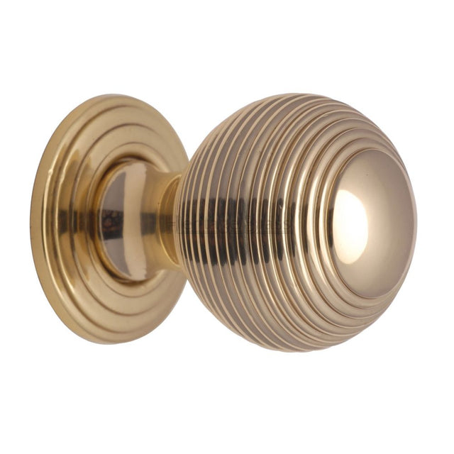 This is an image of a Heritage Brass - Cabinet Knob Reeded Design 32mm Polished Brass Finish, v973-32-pb that is available to order from Trade Door Handles in Kendal.