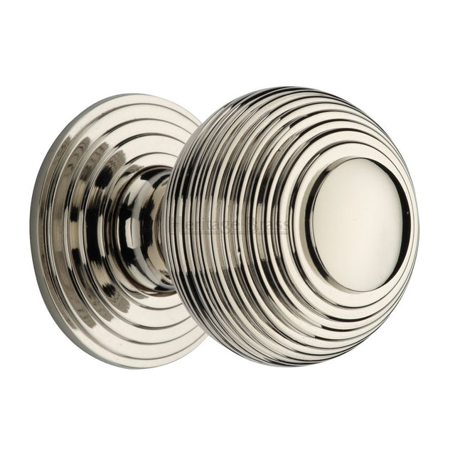 This is a image of a Heritage Brass - Cabinet Knob Reeded Design 38mm Pol. Nickel Finish that is available to order from Trade Door Handles in Kendal