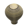 This is a image of a Heritage Brass - Cabinet Knob Reeded Design 32mm Ant. Brass Finish that is available to order from Trade Door Handles in Kendal