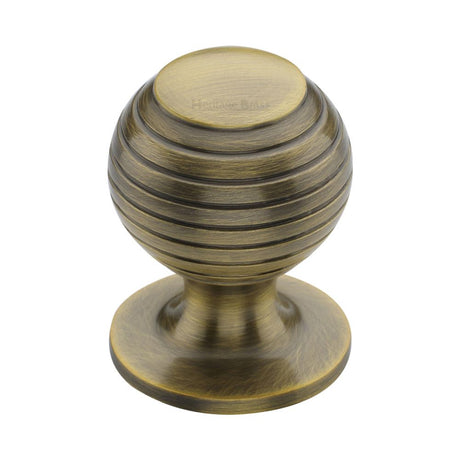 This is an image of a Heritage Brass - Cabinet Knob Beehive Design 32mm Antique Brass Finish, v976-32-at that is available to order from Trade Door Handles in Kendal.