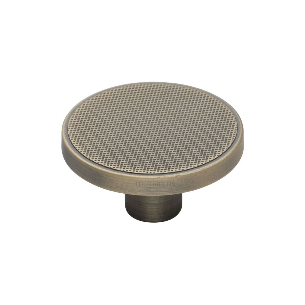 This is an image of a M.Marcus - Brooklyn Cabinet Knob Distressed Brass Finish, vf387-50-db that is available to order from Trade Door Handles in Kendal.