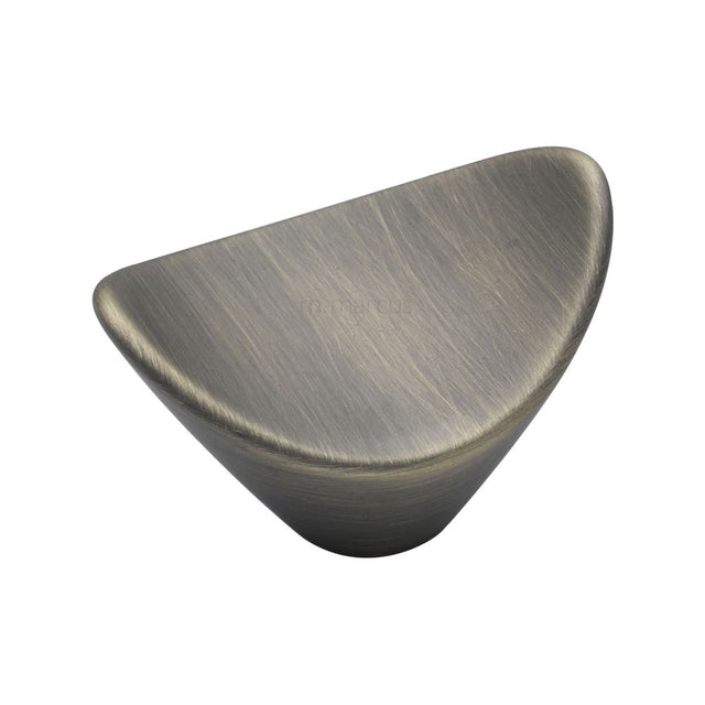 This is an image of a M.Marcus - Calyx Cabinet Knob Distressed Brass Finish, vf392-38-db that is available to order from Trade Door Handles in Kendal.