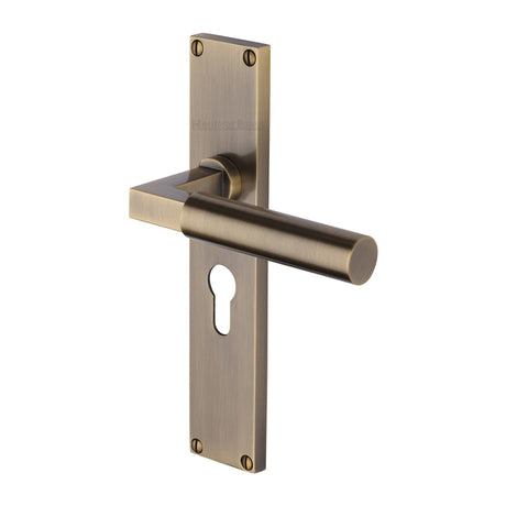 This is an image of a Heritage Brass - Bauhaus Euro Profile Door Handle on 200mm Plate Antique Brass finish, vt6348-at that is available to order from Trade Door Handles in Kendal.