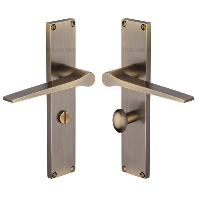 This is an image of a Heritage Brass - Gio Bathroom Set Door Handle on 200mm Plate Antique Brass finish, vt8130-at that is available to order from Trade Door Handles in Kendal.